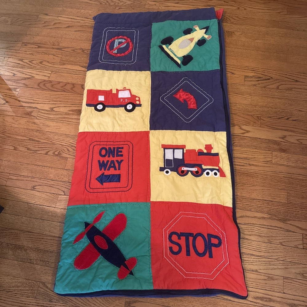 Quilted toddler sleeping bag transportation theme blue green red yellow